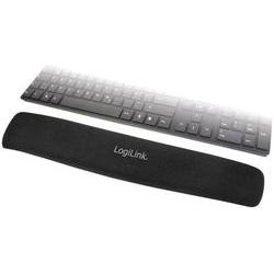 Black gel wrist pad designed for keyboard use, featuring a smooth surface and ergonomic shape, alongside a sleek black keyboard with low-profile keys.