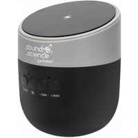Black and silver cylindrical Bluetooth speaker with wireless charging pad and integrated controls on the side.