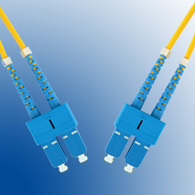 Yellow 15-meter Microconnect InfiniBand/fibre optic cable with blue SC connectors, featuring flexible strain relief and a durable design for reliable data transmission.