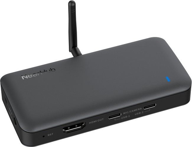 Compact black Nearity Nearhub Air with an antenna, featuring HDMI out, USB ports, and a blue LED indicator, designed for wireless connectivity.