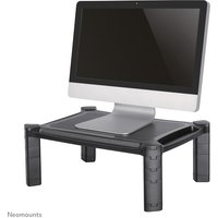 Black Neomounts NSMONITOR20 riser with adjustable legs, supports monitor or laptop, sleek design with sturdy platform.