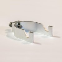 Silver metal bracket with a curved design and bolt, labeled "Next Green Signge rcke 60 mm" by Next Green.