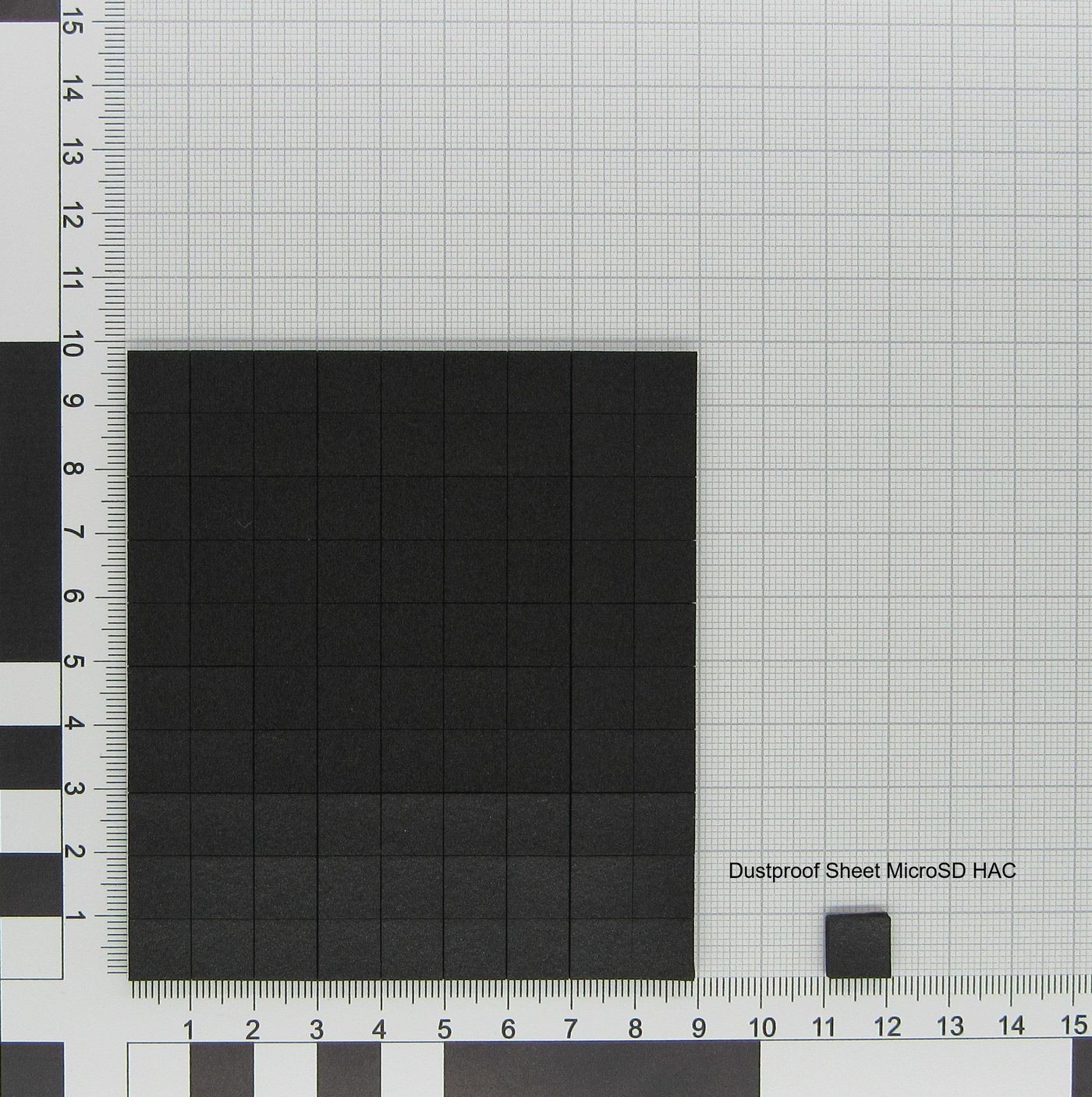 Black dustproof sheet with a grid pattern, featuring a smaller black square in the corner, labeled "Dustproof Sheet MicroSD HAC."