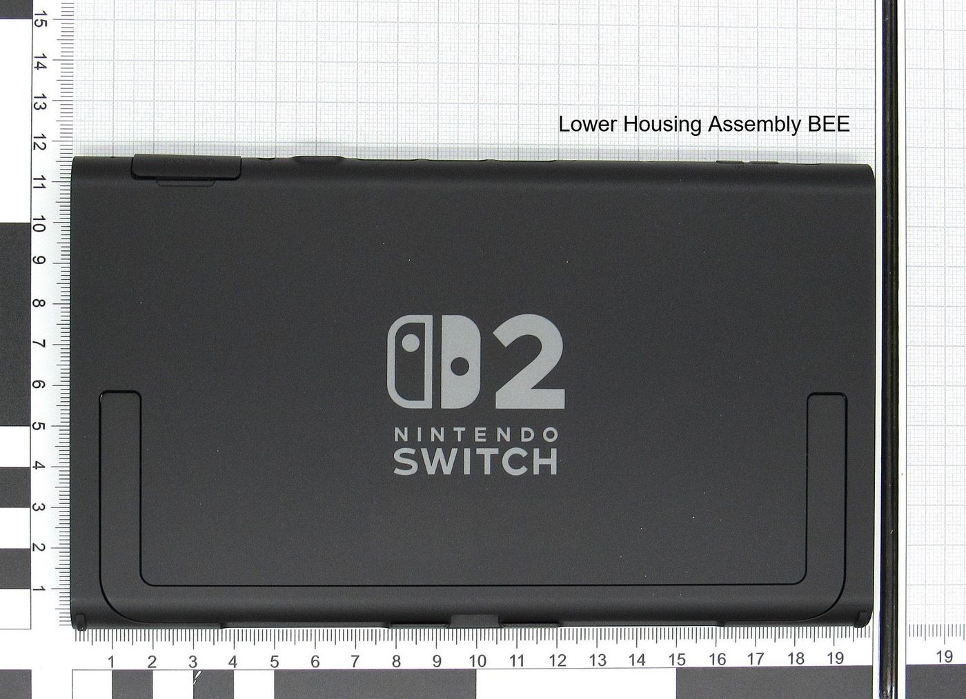 Black lower housing assembly for Nintendo Switch, featuring the Nintendo logo and "SWITCH" text, with a smooth plastic surface and precise cutouts for components.