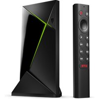 Black Nvidia Shield TV Pro with angular design, green LED strip, and matching remote with Netflix button.