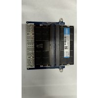 Black Origin Storage 64GB DDR5 SODIMM RAM with blue label, dual 32GB modules, metal contacts visible on the edge.
