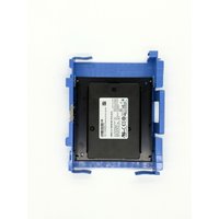 Black Origin Storage 1TB SSD in blue 3.5in hot swap caddy with visible label and connectors.