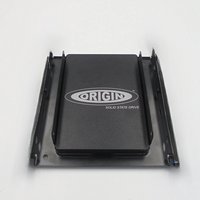 Black Origin Storage SSD 512GB 2.5in with logo, mounted in 3.5in converter bracket, includes cables.
