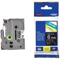 Brother P-Touch TZE315 6mm tape cassette, white text on black, gray plastic casing, packaged in blue and white box.