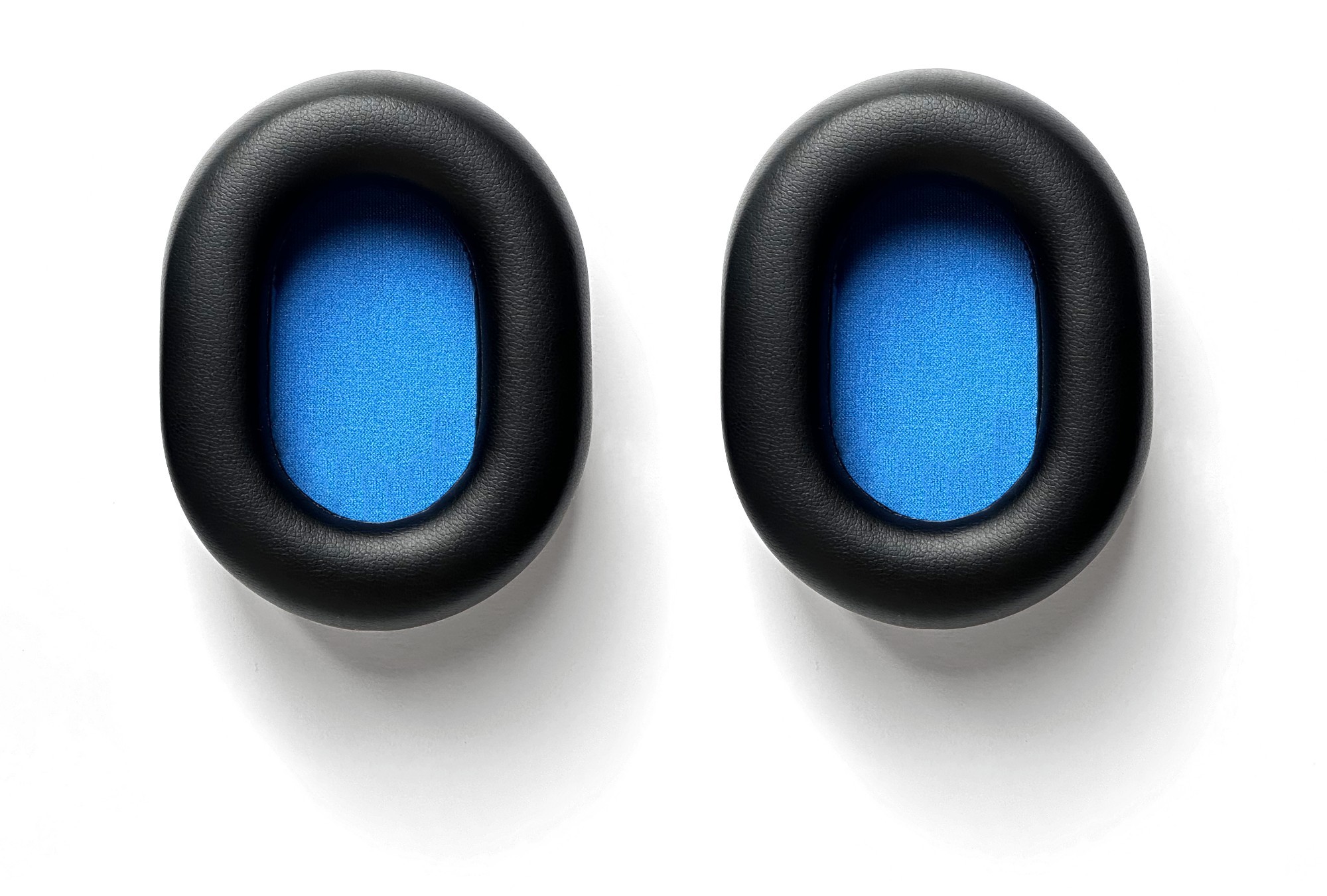 Black leather over-ear cushions with a soft blue foam interior, designed for the Orosound Tilde Evo C headphones, providing comfort and sound isolation.