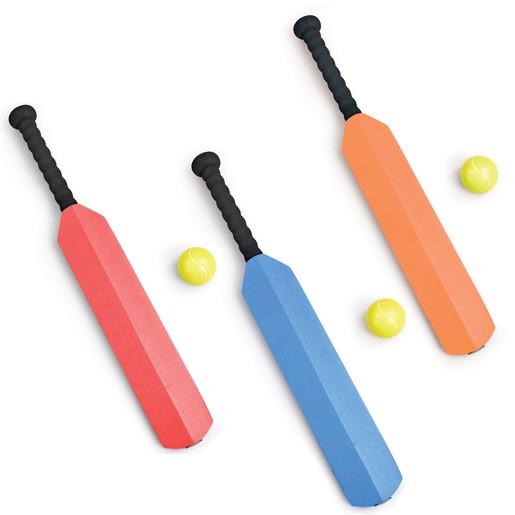 Brightly colored foam cricket bats in red, blue, and orange, paired with two yellow tennis balls, featuring textured black grips for easy handling.