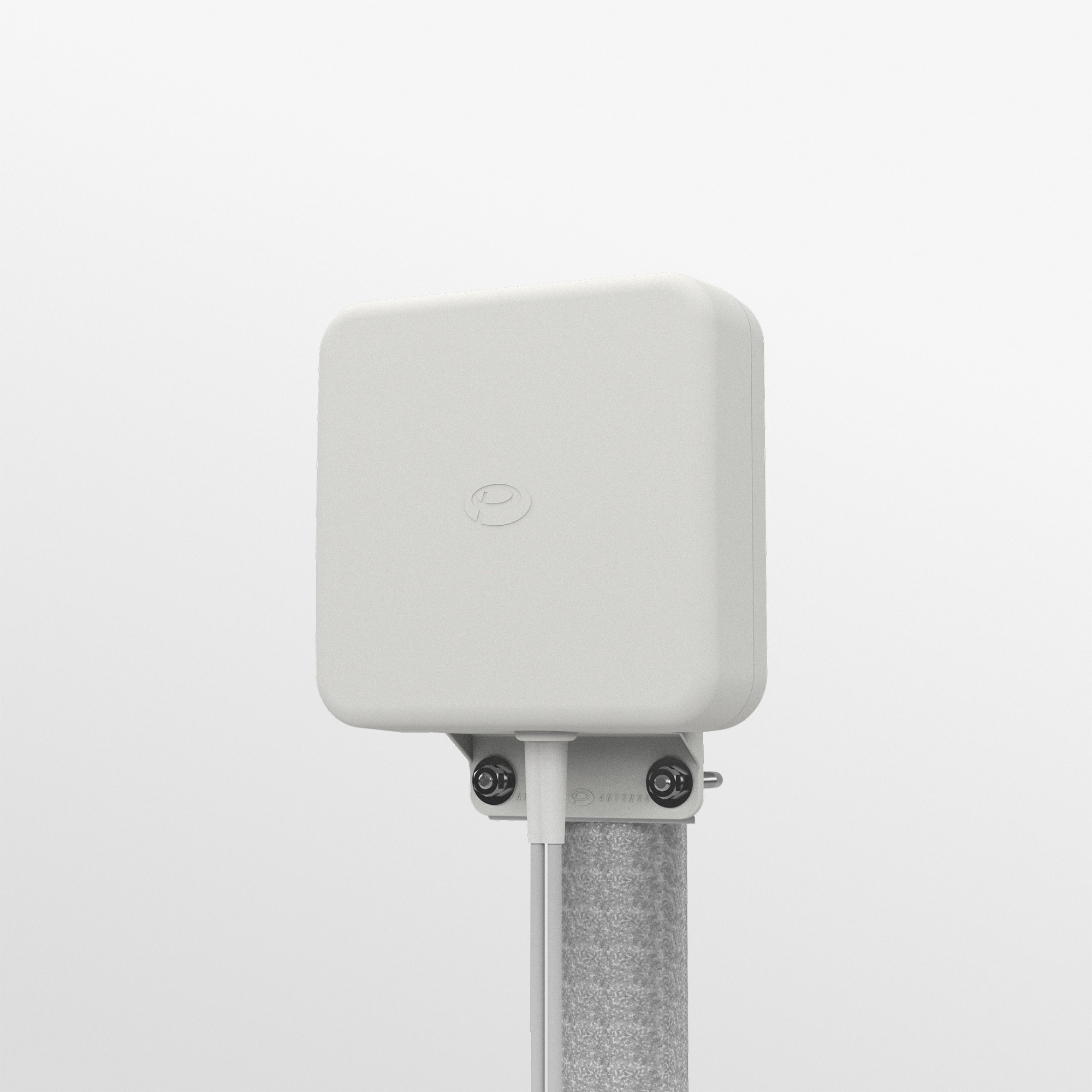 White, rectangular MIMO 4G/5G omni wall mount antenna with a smooth surface, featuring a logo and mounted on a metallic pole with cable connections.
