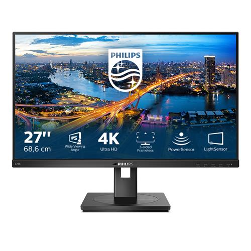 27-inch Philips 278B1 monitor features a sleek black design, 3840 x 2160 pixel resolution, and displays vibrant cityscape graphics with a logo and key specifications on the screen.