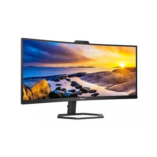Curved black LCD monitor with a 34-inch screen, featuring a wide Quad HD resolution of 3440 x 1440 pixels, mounted on a sleek black stand, displaying a vibrant landscape.