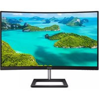 Curved black Philips 31.5" 4K Ultra HD monitor with slim bezels and rectangular stand displaying vibrant island scenery.