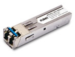 Silver metal transceiver module with a compact design, featuring dual LC connectors and a label indicating "PLANET MTB-SR" and "10000 Mbit/s SFP+" for fiber optic connectivity.