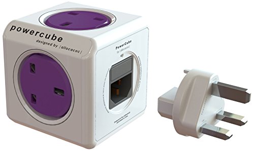 White cube-shaped travel plug with four purple sockets, two USB-A ports, and a detachable white plug, designed for convenience and portability.