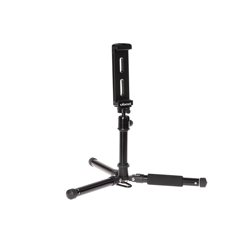 Black metal tablet mount with adjustable holder, cold shoe adaptors, and a portable tripod base featuring rubber feet for stability.