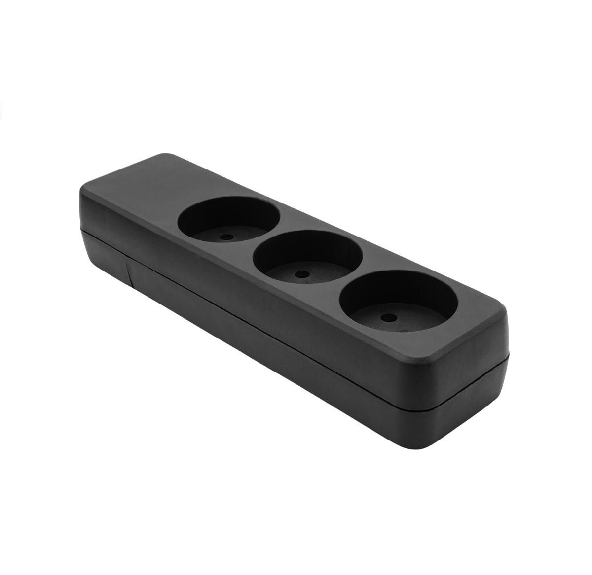 Black, rectangular power strip with three circular outlets, featuring a sleek, minimalist design and made from durable plastic material.