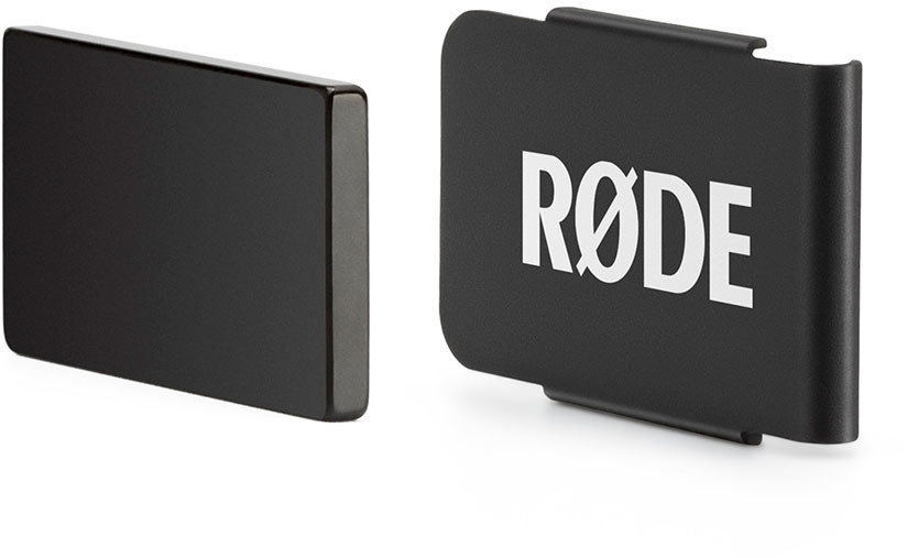 Black metal clip with a sleek design, featuring the white "RØDE" logo on one side and a smooth, glossy finish on the other.