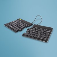 Black R-Go Tools ergonomic split keyboard, QWERTY UK layout, Bluetooth, with break software, connected by a cable.
