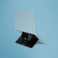 Black aluminum R-Go Tools laptop stand, adjustable, attachable, integrated with laptop, sleek design on blue background.