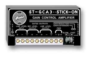 Black rectangular gain control amplifier with white text, featuring line level inputs and outputs, and a series of gold-plated connectors along the bottom.