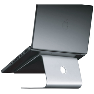 Silver aluminum laptop stand with a sleek design, featuring a circular cutout for cable management and an elevated platform for improved ergonomics.