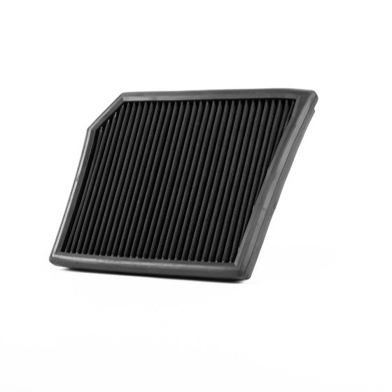 Black rectangular air filter with a textured surface and angled edges, featuring multiple vertical grooves for enhanced airflow and performance.