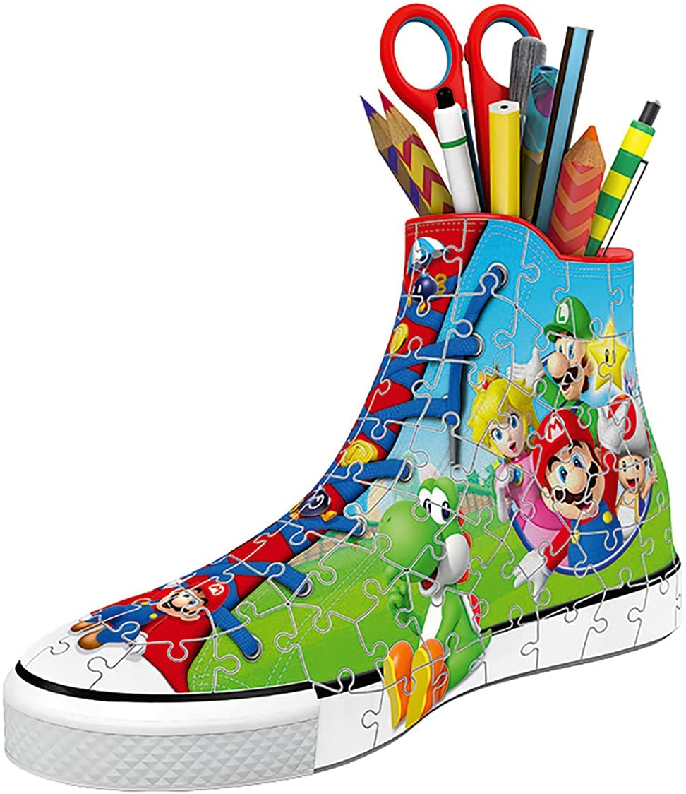 Colorful 108-piece jigsaw puzzle featuring Super Mario characters, set in a vibrant shoe-shaped design with green grass and a blue background, made of sturdy cardboard.