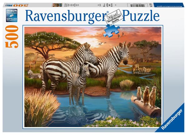 Ravensburger 500-piece puzzle featuring zebras at a waterhole, with lush greenery, a serene landscape, and playful meerkats in the foreground.