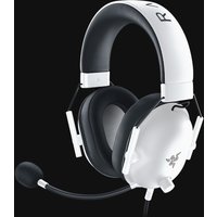 White Razer BlackShark V2 X wired gaming headset with black ear cushions and adjustable headband, featuring a mic.