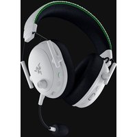 White Razer BlackShark V3 Pro headset with black ear cushions, detachable mic, and green-accented headband.