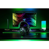 Black Razer Kraken V4 X wired gaming headset with headband, USB Type-C/Type-A connectors, and green accents.