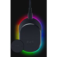 Black Razer wireless mouse dock with USB connection, RGB lighting, and sleek design for indoor charging.