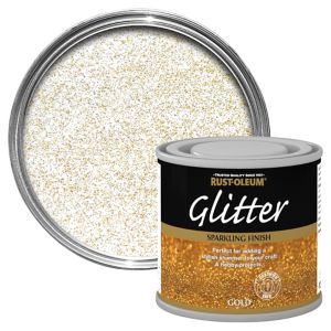 Gold glitter paint in a 125ML can, featuring a black label with gold text, alongside a lid showing sparkling gold glitter texture.