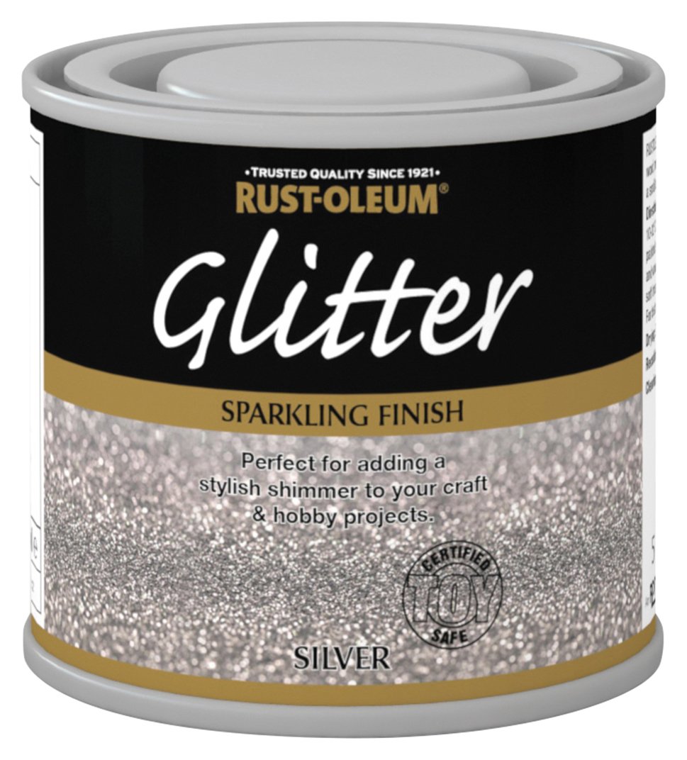Rust-Oleum Sparkling Silver Glitter Paint in a 125ml can, featuring a silver glitter finish, a black label with gold accents, and a "Toy Safe" certification.
