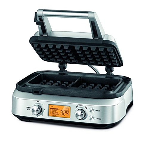 Sleek silver and black waffle maker with a digital display, dual compartments, and adjustable temperature controls for perfect waffles.