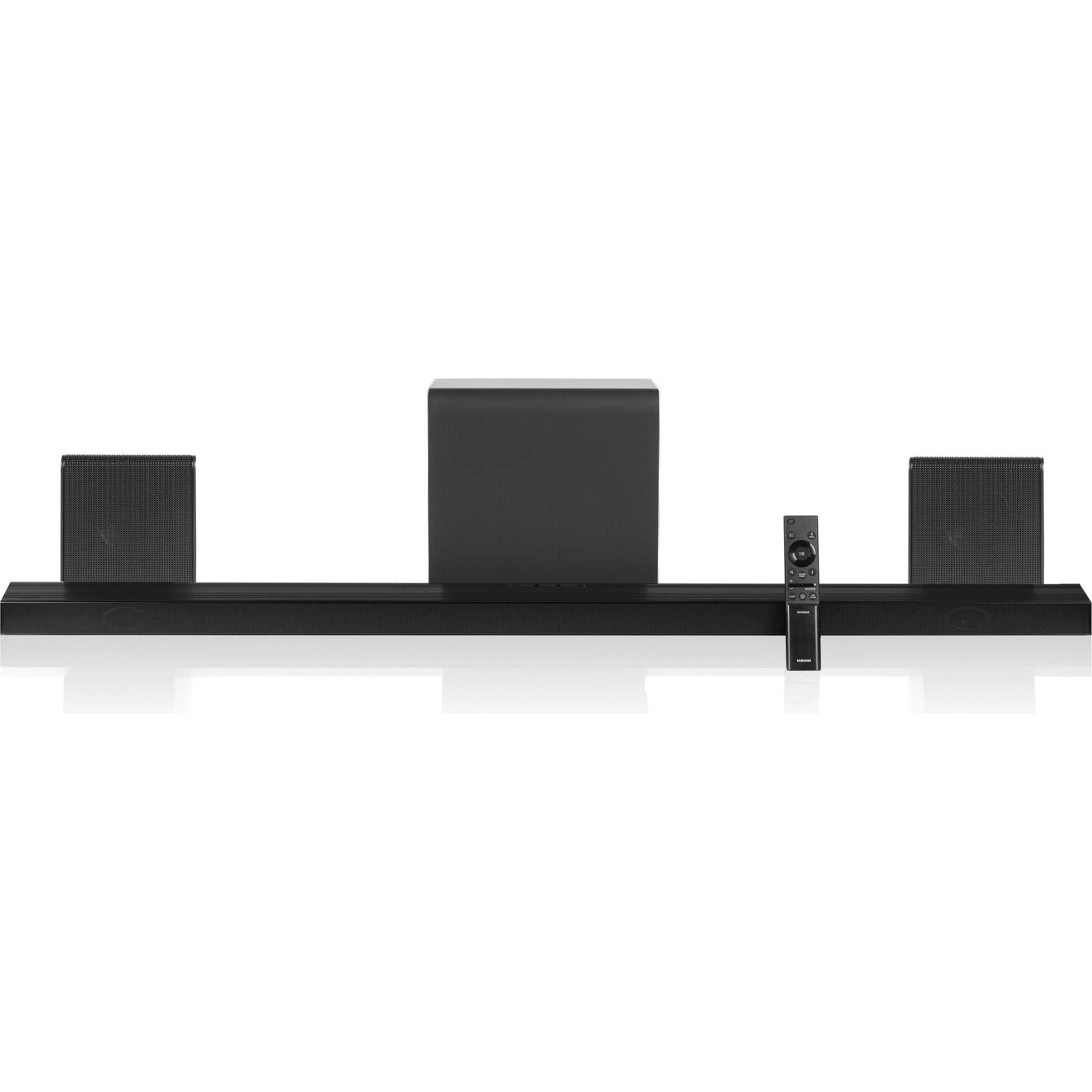 Samsung Q-series QS750F soundbar in sleek black with a rectangular subwoofer, two rear speakers, and a remote control, designed for immersive 5.1.2 channel audio.