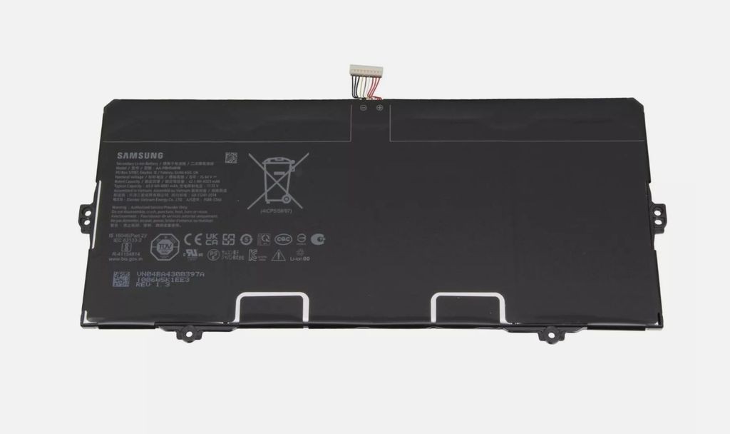 Black Samsung SSY battery with a sleek design, featuring a label with technical specifications and a connector cable on one end.