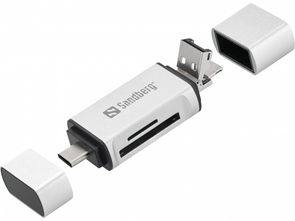 Silver and black Sandberg Card Reader with USB-C, USB, and MicroUSB connectors, featuring a compact design and removable caps for protection.