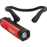 Red Sealey rechargeable LED head torch with black side mount and adjustable strap.