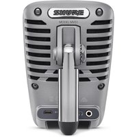 Grey Shure MOTIV MV51 digital camcorder microphone with retro grille design and adjustable kickstand.