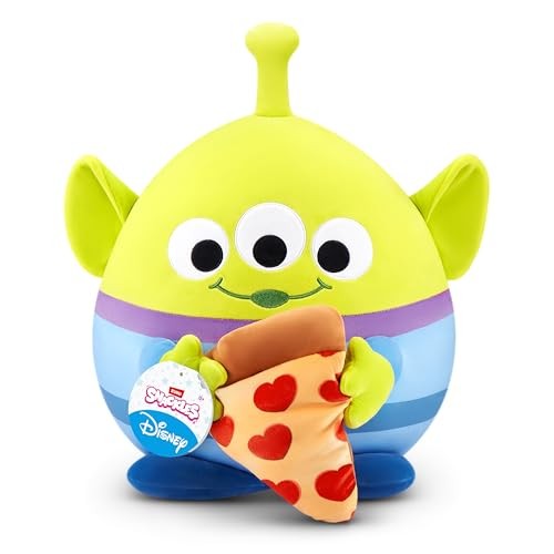 Bright green soft toy alien with three eyes, wearing a blue and purple striped body, holding a heart-patterned ice cream cone, featuring a small tag with Disney branding.