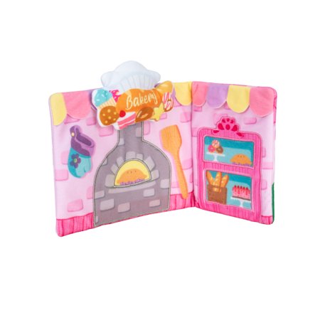 Colorful fabric book featuring a bakery scene with a chef hat, oven, baking utensils, and various pastries, all in soft, plush materials.