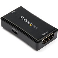 Black rectangular StarTech.com HDMI signal booster with input and output ports, labeled in white text.