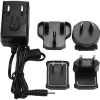 Black StarTech.com DC power adapter with 5V, 2A output, includes multiple international plug attachments and coiled cable.