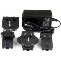 Black StarTech.com 9V, 2A DC power adapter with interchangeable plug heads and coiled cable.