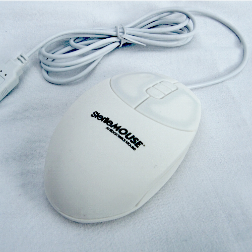 White, ergonomic mouse with a smooth surface, featuring a single button and a scroll wheel, connected by a white cable, labeled "SterileFLAT Hypertec RAS Admor Mouse."