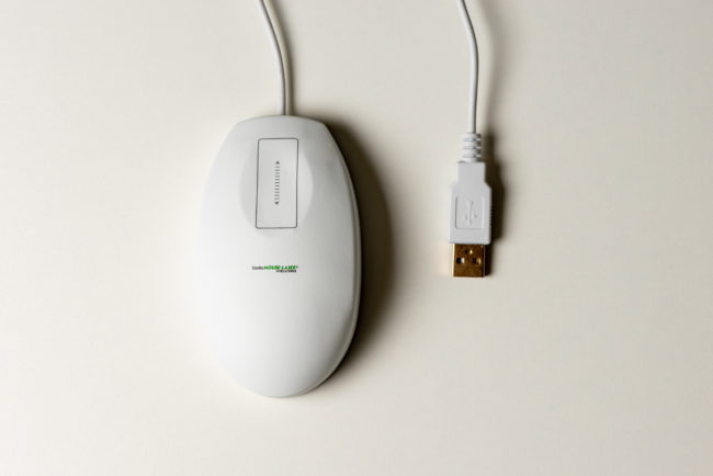 White, sleek USB wired mouse with two buttons and an up/down slider control, featuring a minimalist design and subtle branding on the surface.